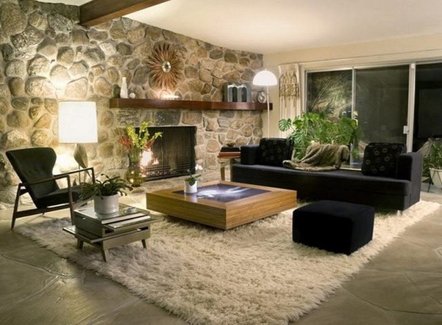 ruang tamu dengan dinding batu