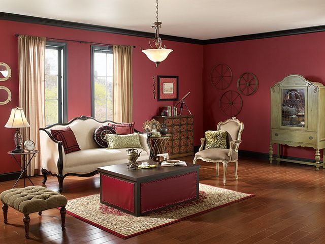unsur dan elemen dasar desain interior; ruang tamu gaya klasik dengan warna merah yang tegas dan berani